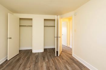 a bedroom with two closets